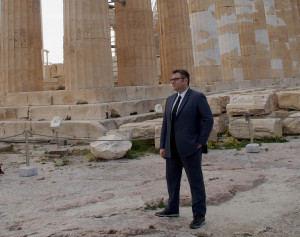 Vasilis Sotiropoulos, Lawyer to the Athenians' Association, standing in front of the Parthenon